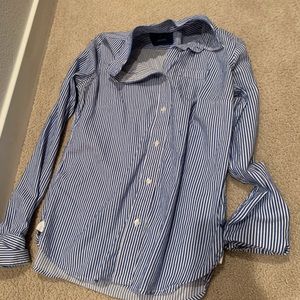 Blue and white striped polo